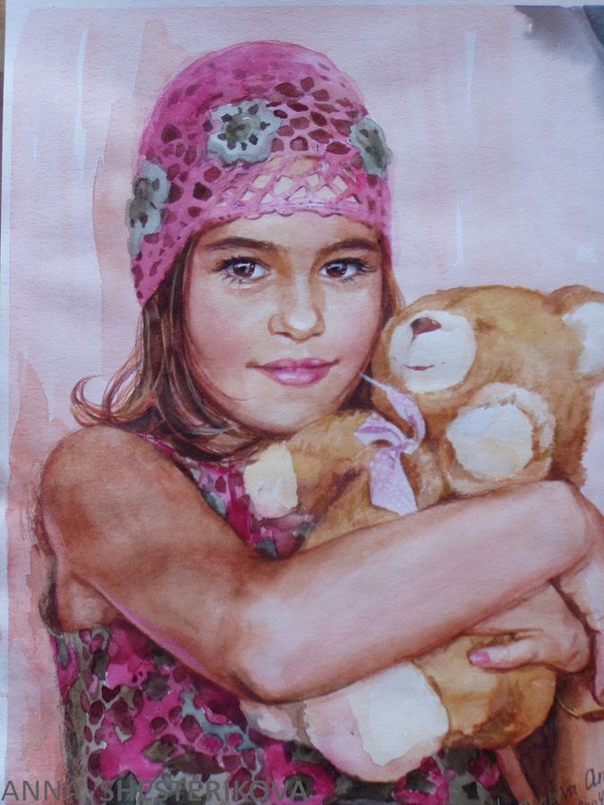 A girl with a teddy bear